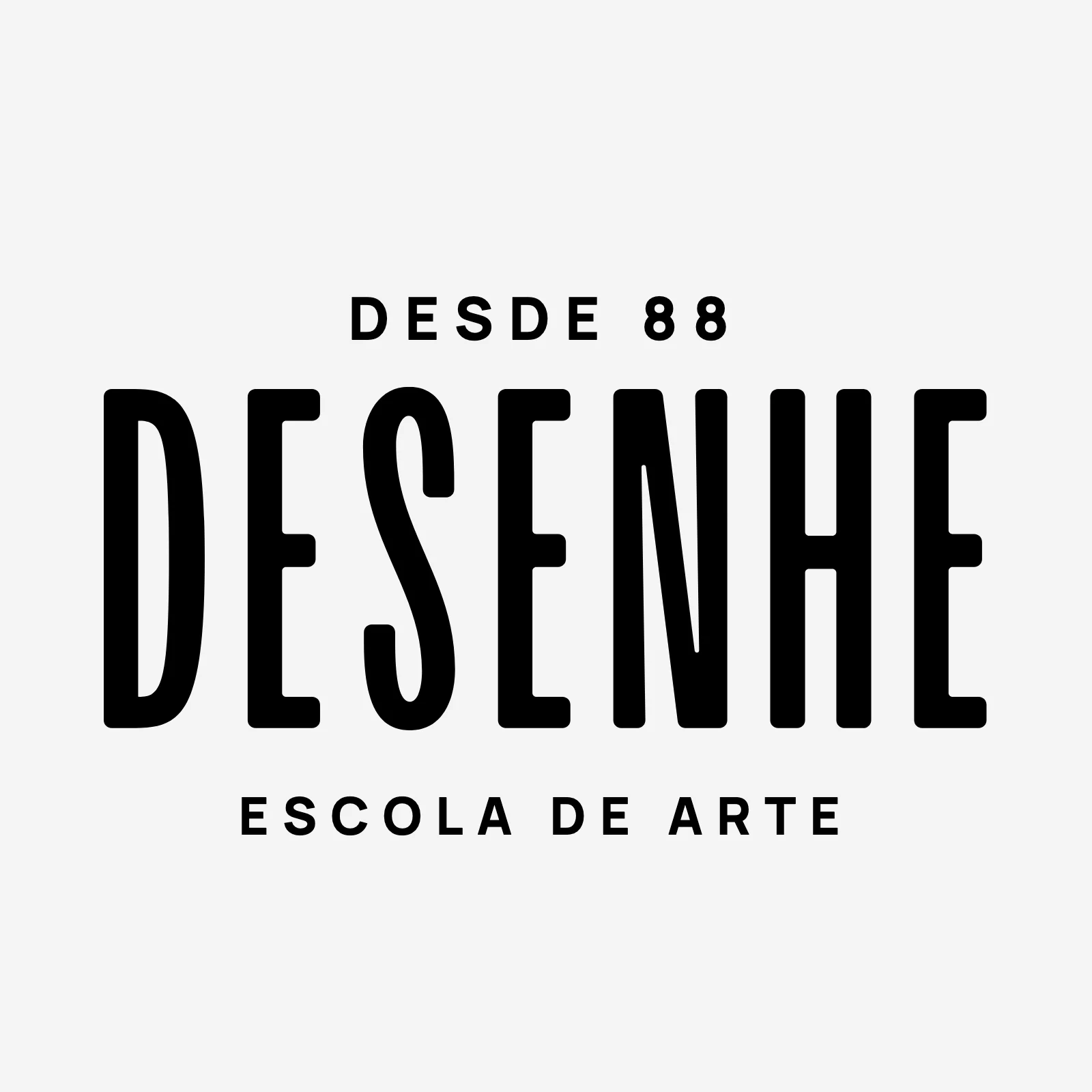 Lockup in black on light gray: Since 88 above the name DESENHE and Art School below