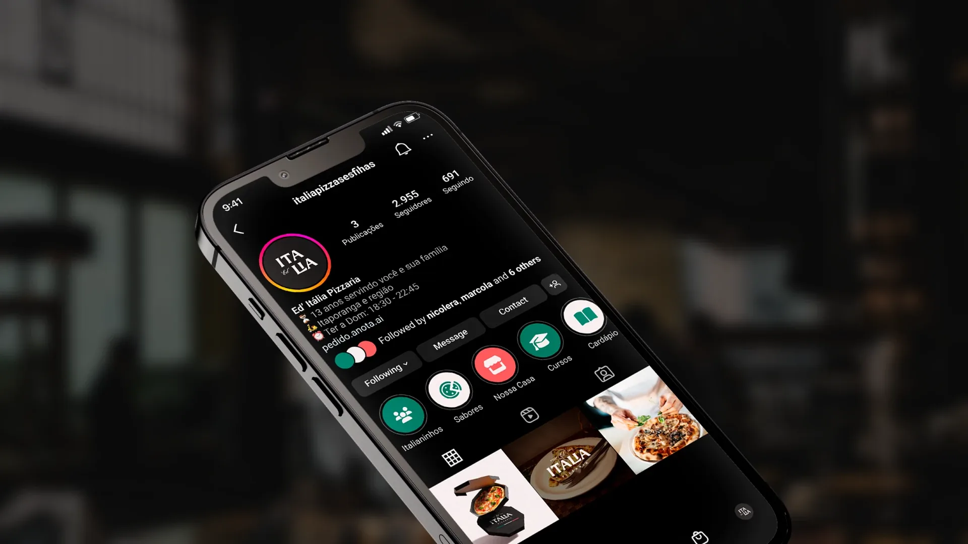 Ed' Italia Pizzeria Instagram profile on a phone over a dark background