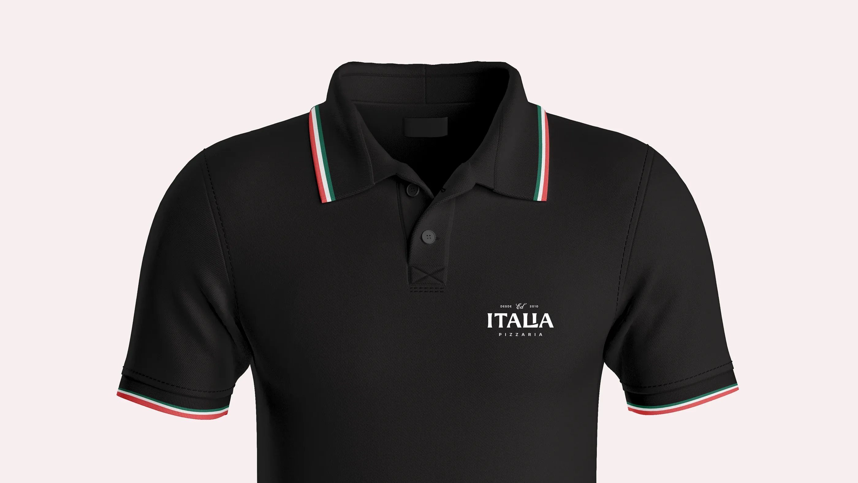 Black polo shirt with green, white and red collar and the embroidered logo