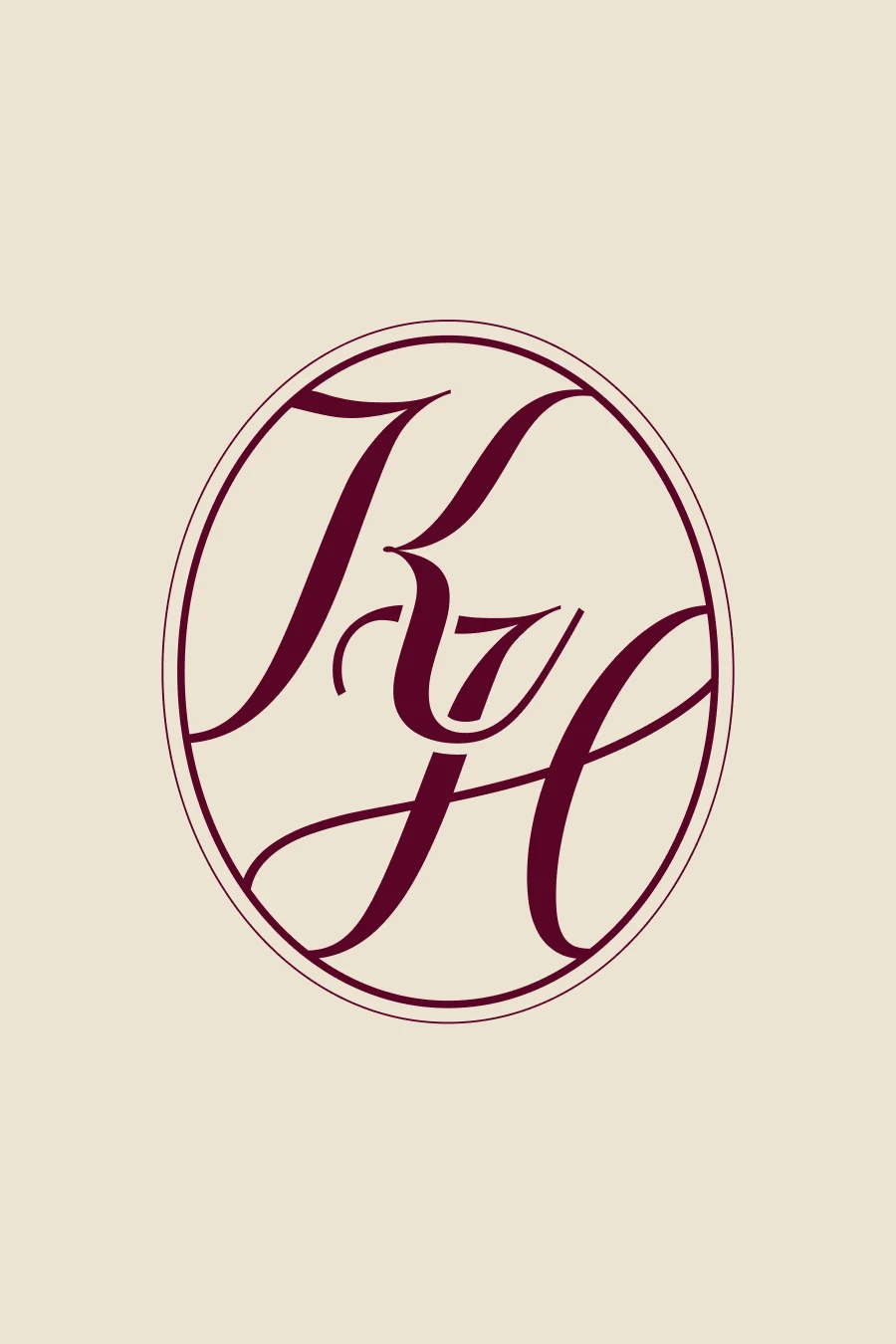 KH monogram in bordeaux inside an oval frame, on a sand background