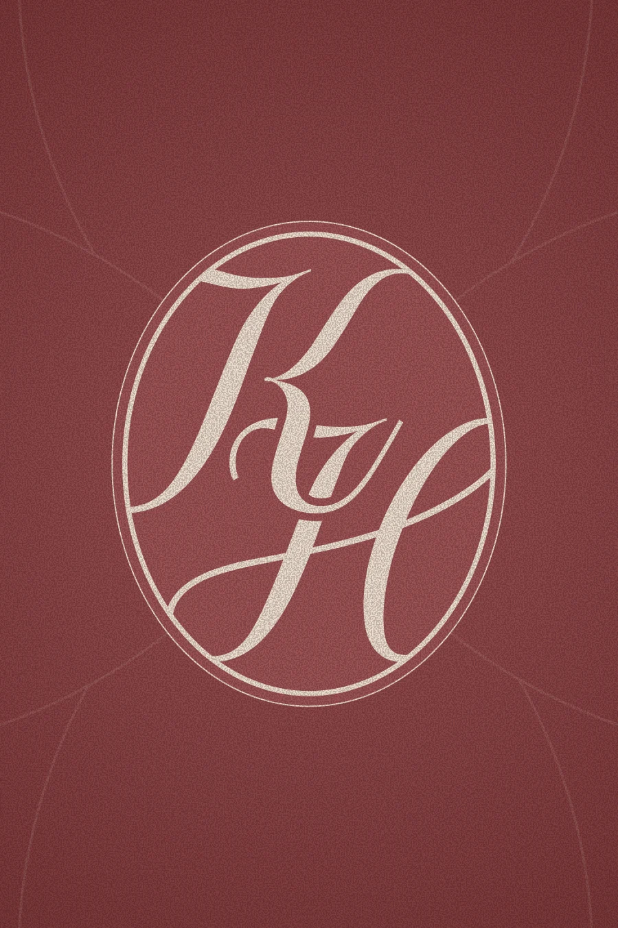 KH monogram in cream inside an oval frame, on a terracotta background