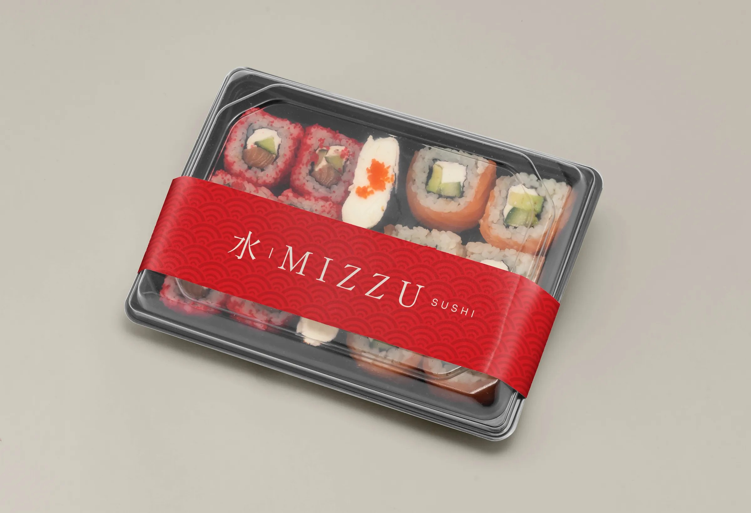 Tray of assorted sushi with the Mizzu band