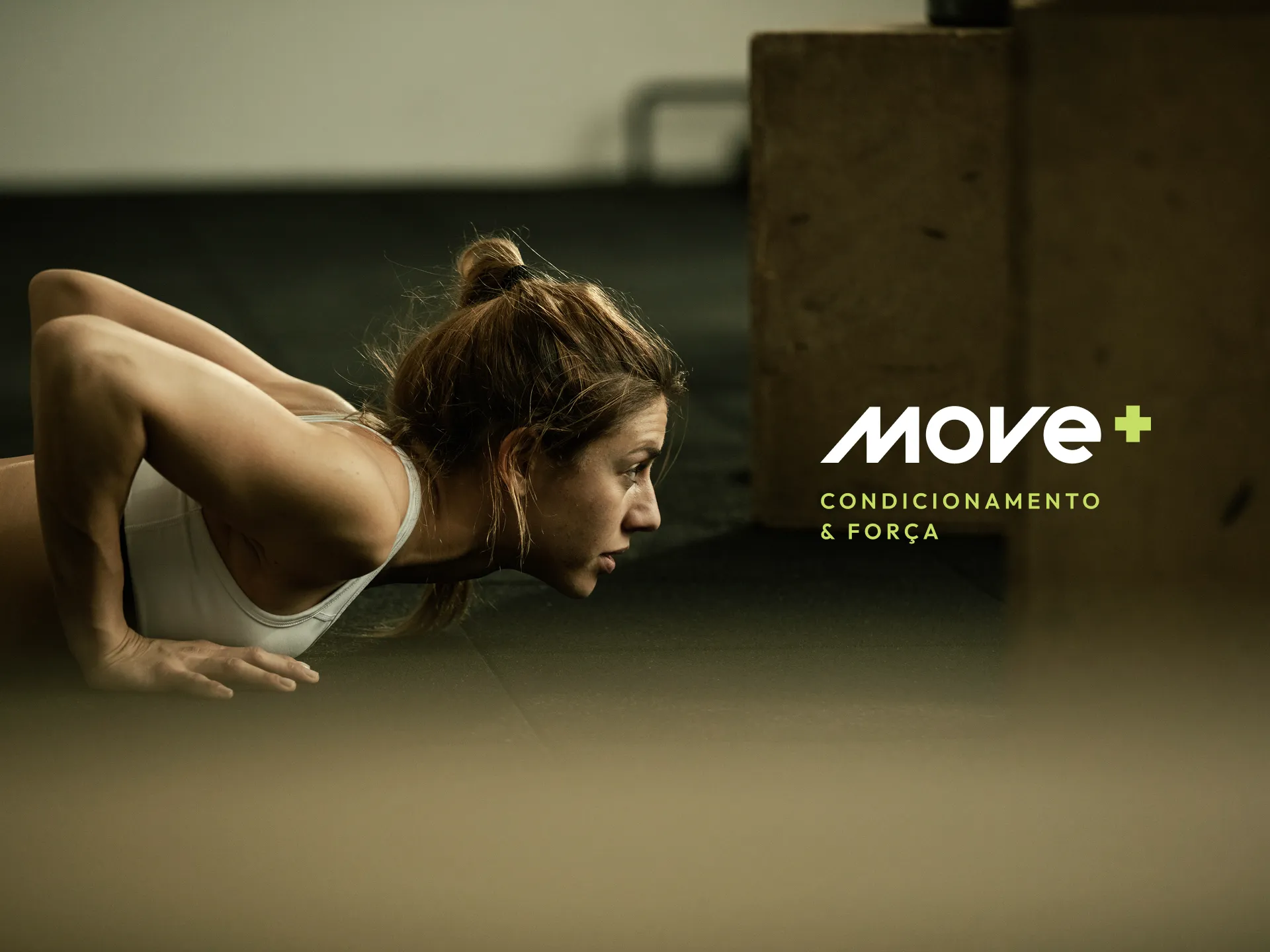 Woman in a push-up position on a studio floor, with the Move+ logo and the line Conditioning and Strength
