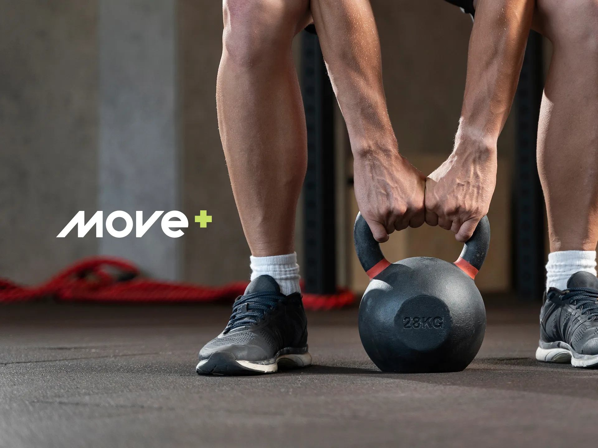 Person lifting a kettlebell, with the white Move+ logo beside it
