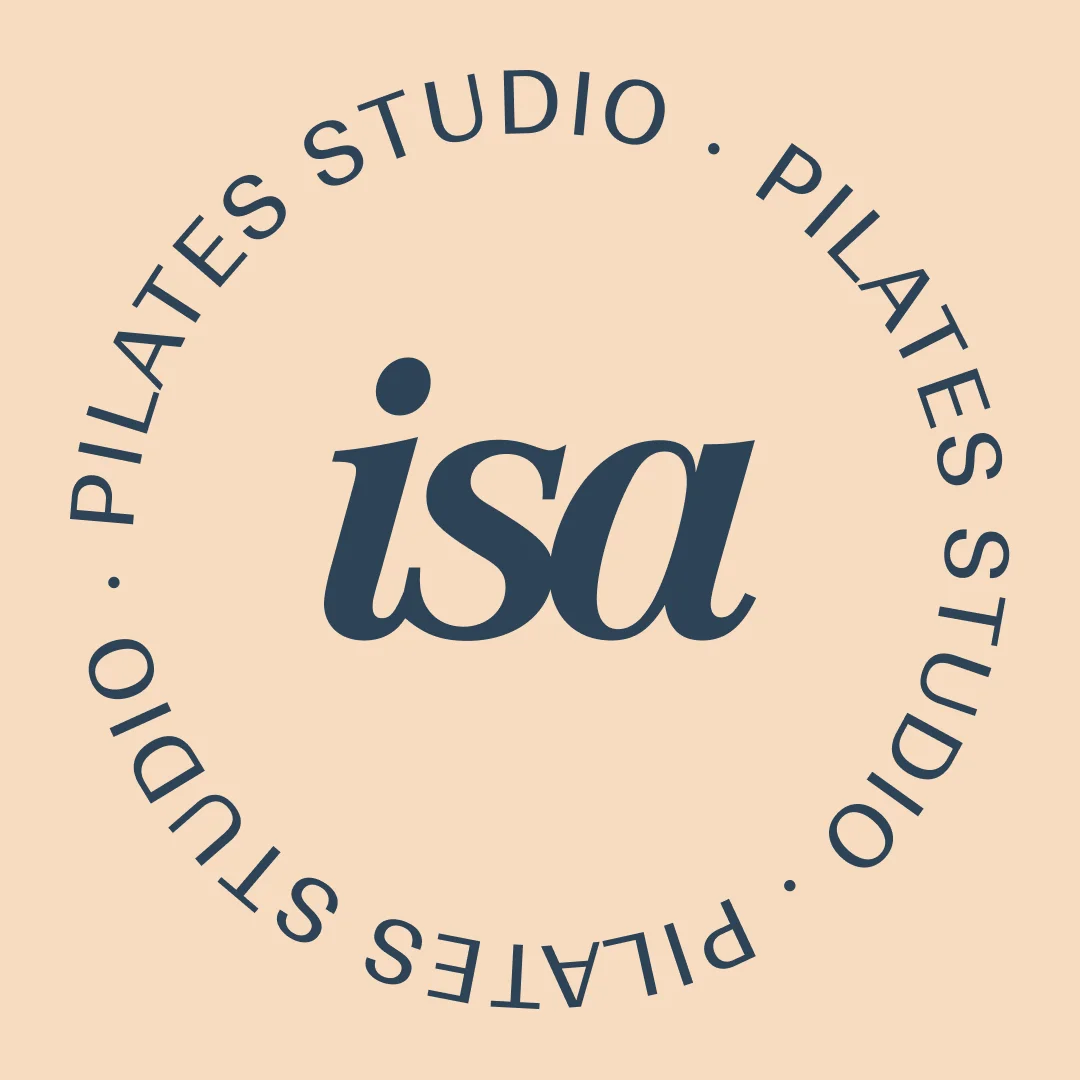 Circular seal with the isa monogram and the line Pilates Studio repeated around it