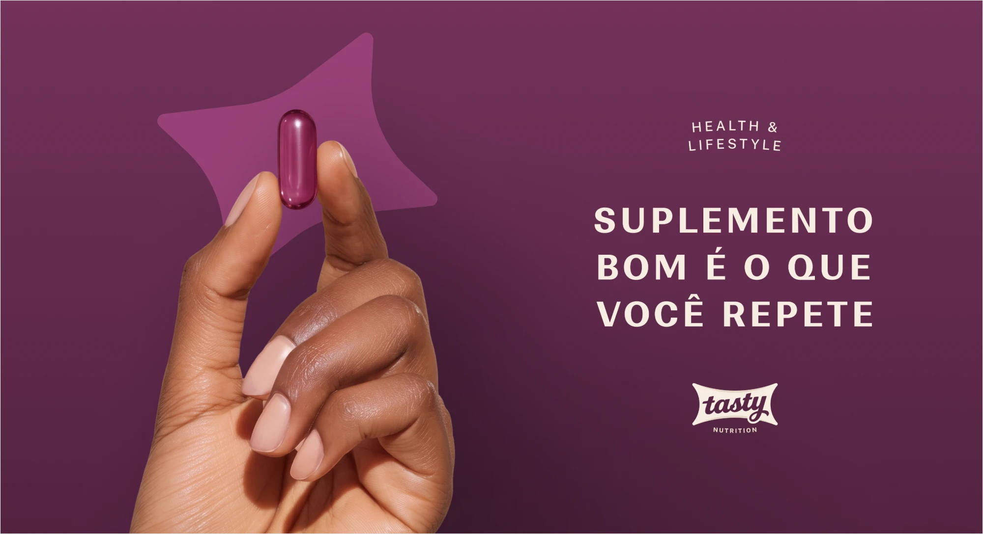 Purple ad with a hand holding a capsule and the line “Suplemento bom é o que você repete”